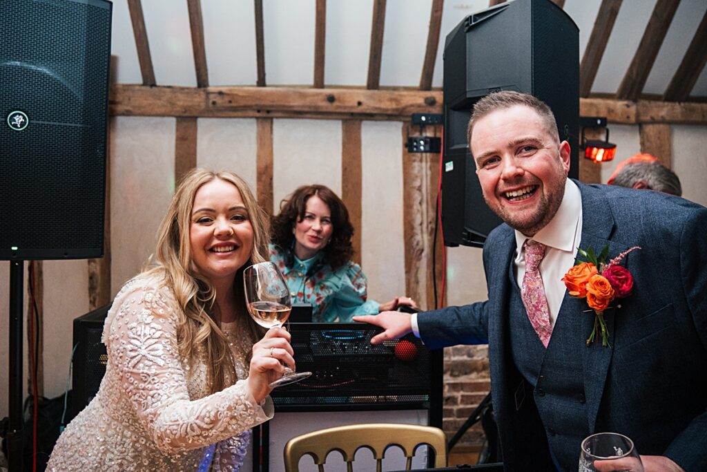 hot pink, orange and disco balls for autumn wedding at Blake Hall